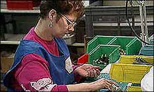 A woman working in a factory