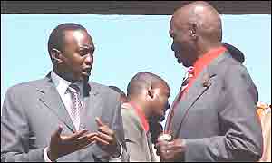 Uhuru Kenyatta (left) and President Moi (right) 