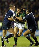 Gregor Townsend and Budge Poutney in action for Scotland