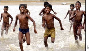 Children playing on the beaches of Madras
