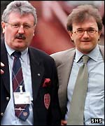 Roger Mitchell with Hearts' chief executive Chris Robinson (left)