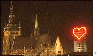 Neon heart above Prague castle