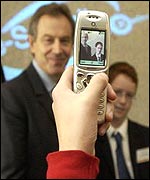 Tony Blair has his picture taken on a cameraphone
