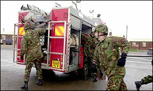 soldiers red fire engines