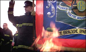 Striking firefighters picket a Belfast station