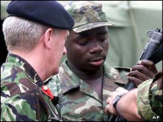 Colonel Mike Dent and Sierra Leonean soldier
