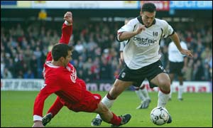 Markus Babbel tackles Fulham's Steed Malbranque