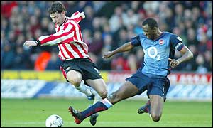 Arsenal captain Patrick Vieira battles with Southampton's Rory Delap