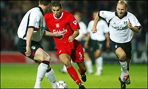 Baros runs at Steve Finnan