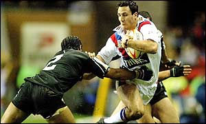 Great Britain's Lee Gilmour hands-off New Zealand's Henry Faafili 