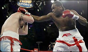 Audley Harrison lands a jab on Shawn Robinson 