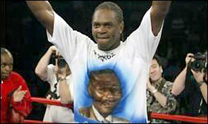 Harrison wears a T-shirt adorned with a picture of his Uncle Rowland, who died suddenly two weeks ago 