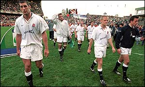 England's dejected players leave the pitch after suffering Six Nations defeat to Ireland