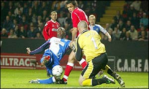 Blackburn's Andy Cole is denied by Charlton Athletics goalkeeper Dean Kiely 