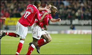Charlton's Richard Rufus celebrates his goal with Shaun Bartlett (behind) and Scott Parker (left)