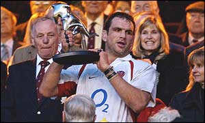 England captain Martin Johnson lifts the Mandela Cup after defeating South Africa