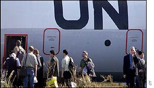 UN weapons inspectors board a plane in Cyprus on Monday