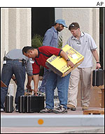 UN weapons inspection equipment is unloaded in Baghdad before the inspectors' arrival