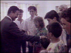 Saddam Hussein with western hostages on Iraqi TV