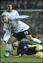 Deon Burton breaks through the Wimbledon defence