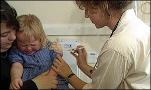 Child being immunised