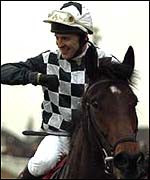 Happier times for Graham Bradley after winning the Champion Hurdle on Collier Bay