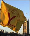 A Fire Brigades Union strike banner flies opposite the Houses of Parliament 