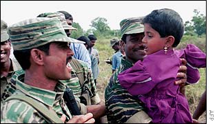Tamil Tiger soldiers with child in Omanthai
