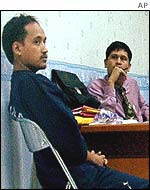 Imam Samudra, left, is questioned by a detective in Jakarta on Wednesday