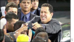 President Chavez surrounded by supporters