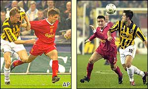 Michael Owen and Vladimir Smicer are challenged by the Dutch defence