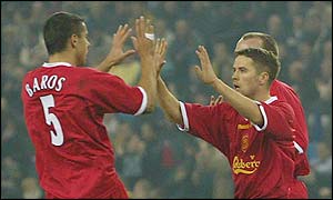 Michael Owen (right) celebrates his goal with provider Milan Baros