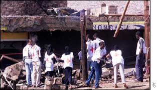Red Cross workers remove rubble from the Paradise Hotel 