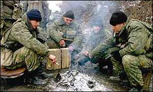 Russian soldiers around a fire