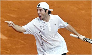 Sebastien Grosjean celebrates after winning the second rubber