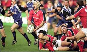 Mike Mullins' two injury-time tries put the gloss on Munster's win