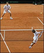 Yevgeny Kafelnikov lobs Nicolas Escude