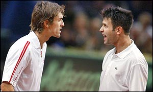 Nicolas Escude and Fabrice Santoro have some strong words for each other