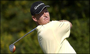 Ernie Els plays a tee shot in Sun City