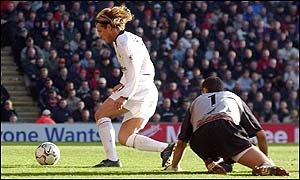 Diego Forlan opens the scoring for Manchester United after a mistake by Jerzy Dudek