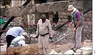 Investigators search site of hotel blast