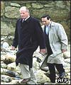 King Juan Carlos inspects the damage