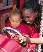 Jennifer, refugee from Sudan, with her son