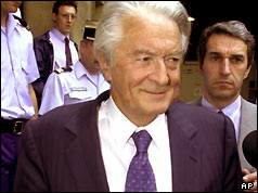 Roland Dumas emerges from court after sentencing