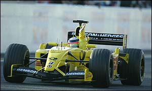 Takuma Sato celebrates his fifth place at the Japanese Grand Prix