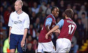 Aston Villa's Darius Vassell celebrates scoring the opening goal against Preston