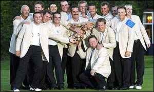The European team pose with the Ryder Cup after a memorable victory