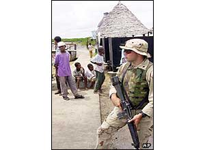 A marine in a Kenyan village