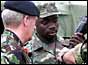 Colonel Mike Dent and Sierra Leonean soldier (AP)