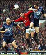 Martin Keown rises above Ruud van Nistelrooy